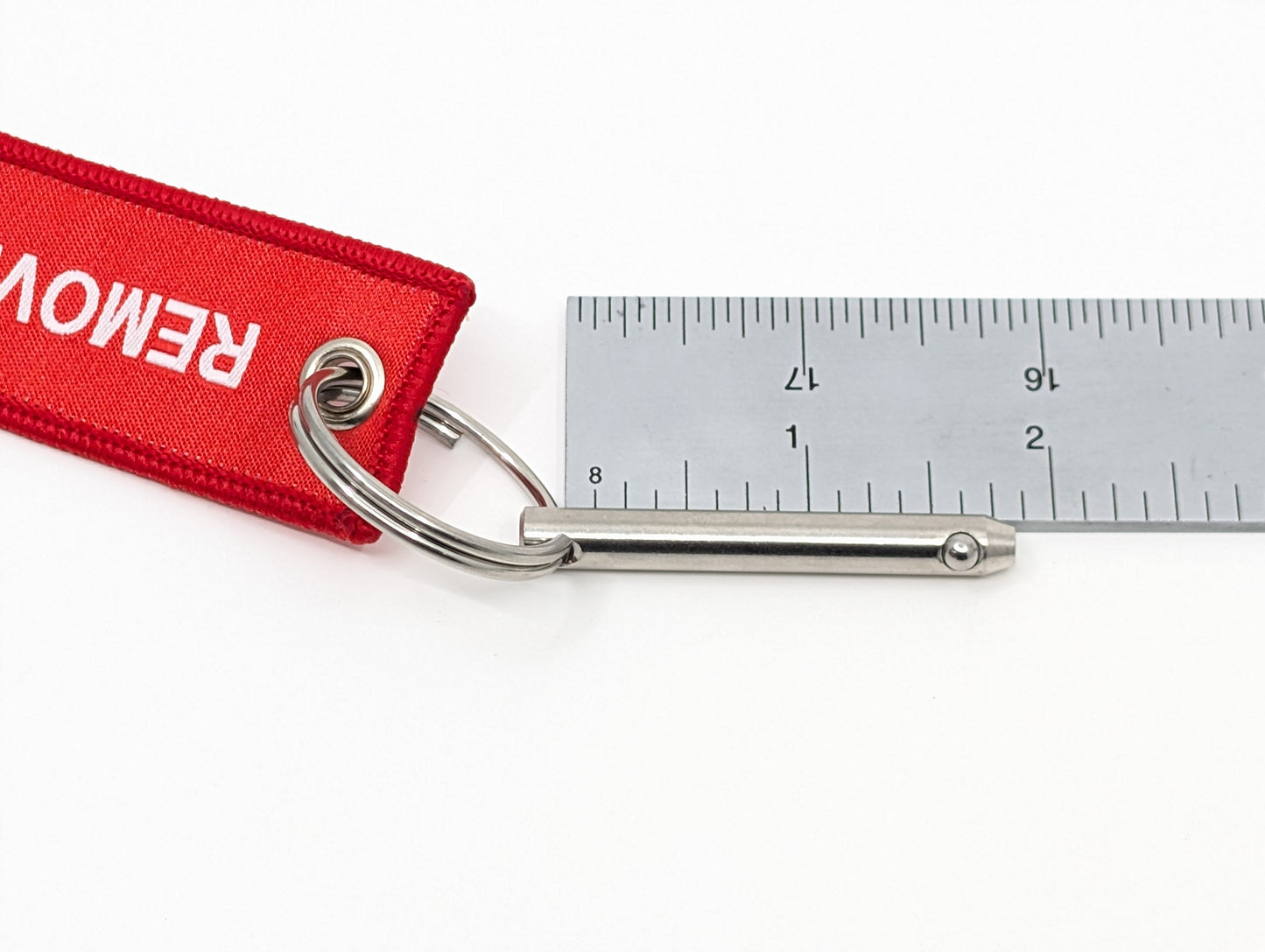 Weapon Lock Pin with Remove Before Fight Tag