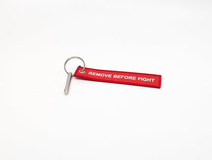 Weapon Lock Pin with Remove Before Fight Tag