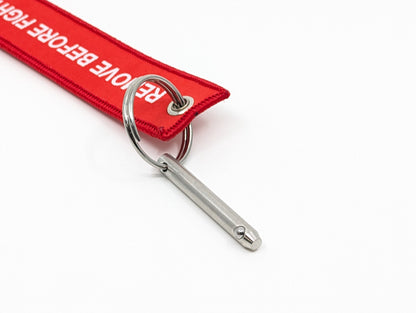 Weapon Lock Pin with Remove Before Fight Tag